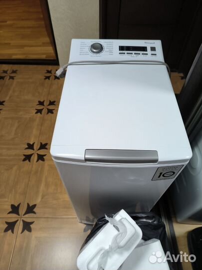 Стиральная машина с вертикальной загрузкой