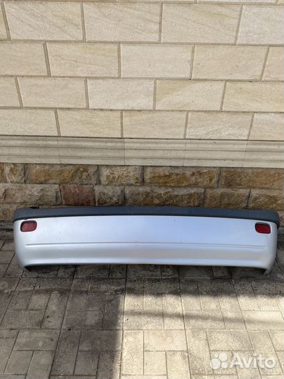 Бампер задний Toyota Raum exz10 exz15