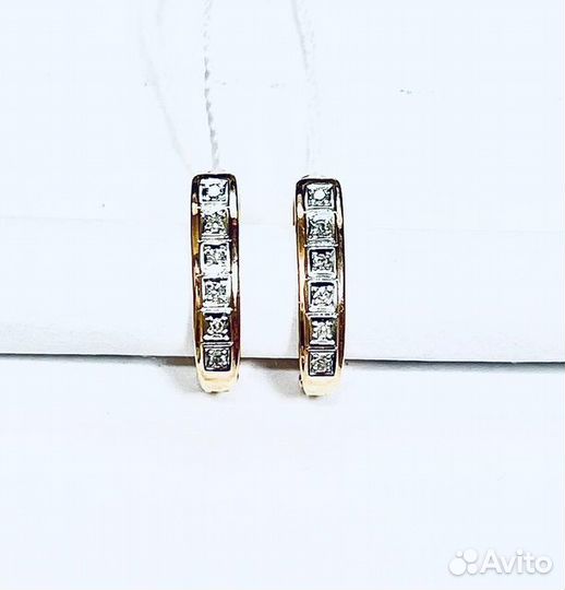 Золотые серьги с камнем