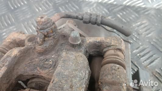 Суппорт тормозной задний правый citroen C4 picasso 2 (SNP08OO01)