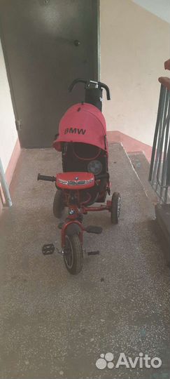 Детский велосипед с тростью BMW