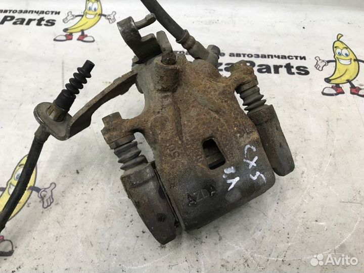 Суппорт тормозной задний левый Mazda Cx-5 KE