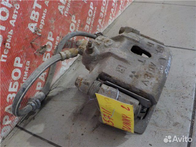 Суппорт передний правый Nissan Sunny traveller