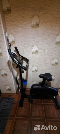 Велотренажёр б/у Decathlon bike 900 Domyos, черный