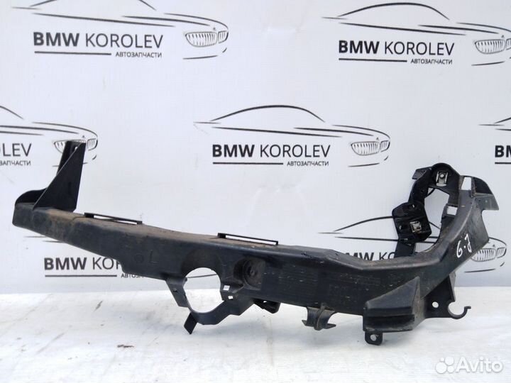 Кронштейн фары левый рест. BMW E90