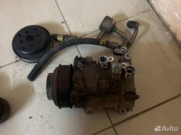 Компрессор кондиционера с муфтой Lexus is250