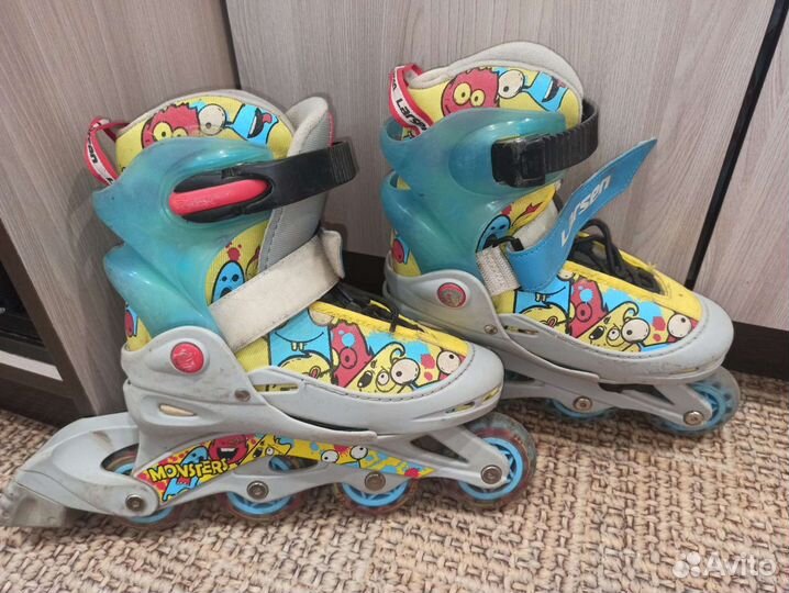 Роликовые коньки