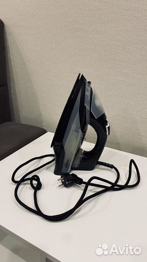 Гладильная доска и утюг