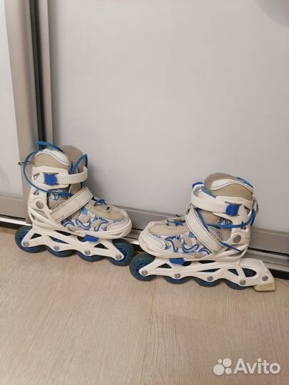 Роликовые коньки