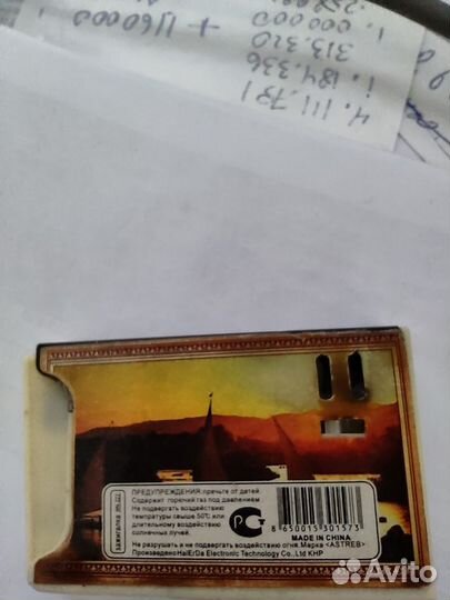 Зажигалка в виде шлепанца