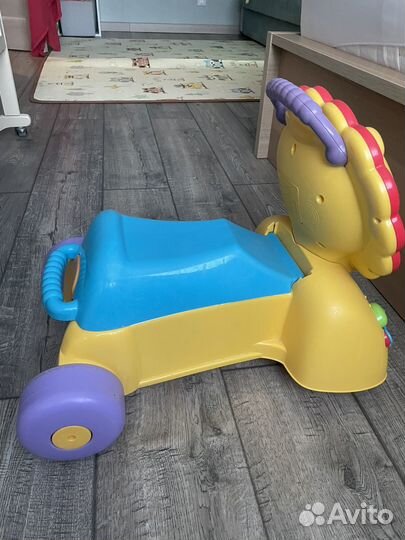 Каталка лев fisher price