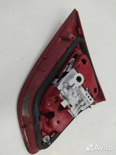 Б/У Фонарь крышки багажника левый 21620201 opel