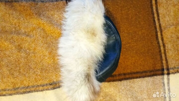 Женские меховые шапки