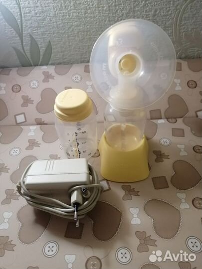 Молокоотсос medela