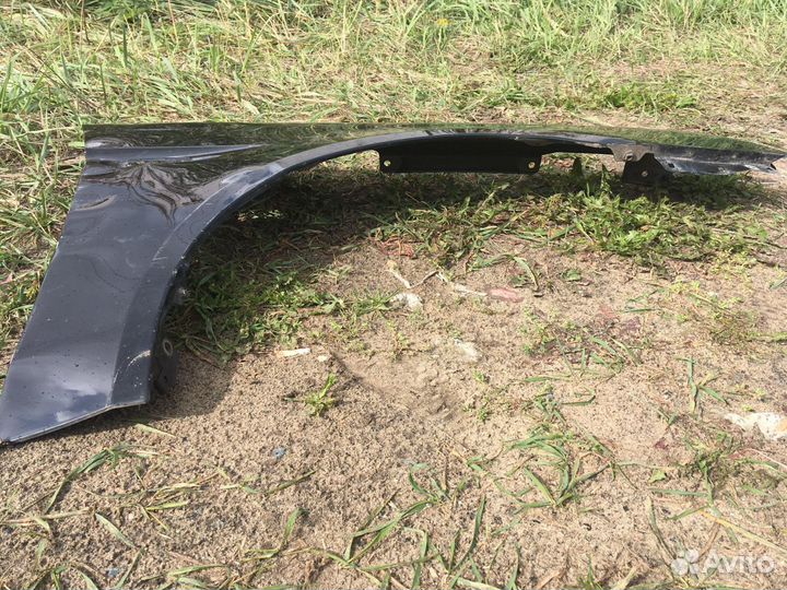 Переднее крыло Mitsubishi Lancer 10