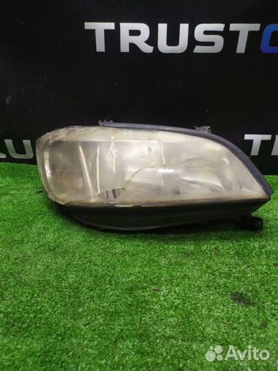 Фара галогеновая передняя правая Opel Zafira