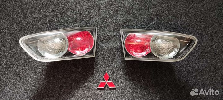 Фонарь в крышку багажника Mitsubishi Lancer X