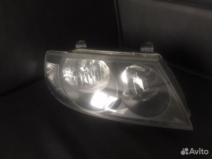 Фара правая черная 2601095F0E Almera Classic B10