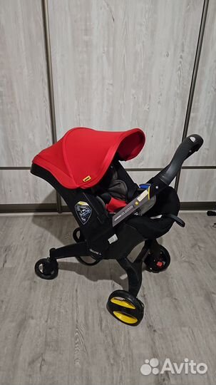 Автокресло с колёсами Doona и isofix