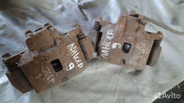 Суппорт передний lancer 9