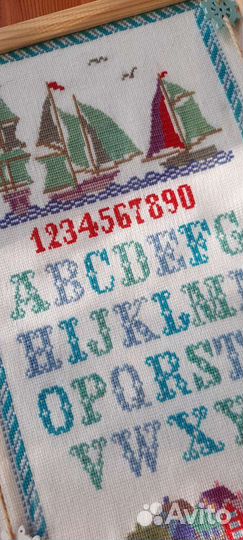 Вышитый алфавит на английском языке в рамке