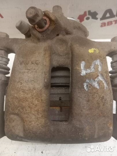 Суппорт тормозной задний правый Volkswagen Passat