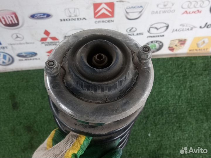 Стойка амортизатора передняя Volkswagen Passat B5