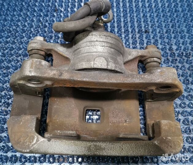 Суппорт Mazda Demio