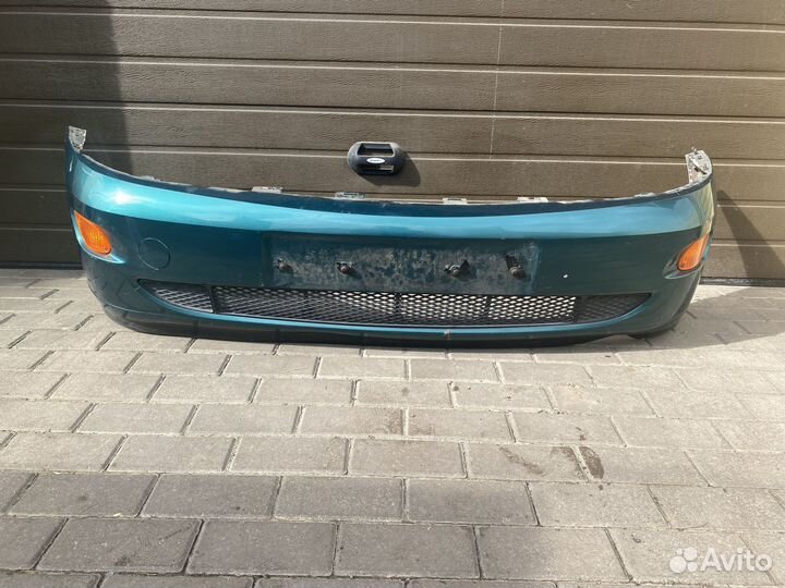 Передний бампер Ford Focus 1