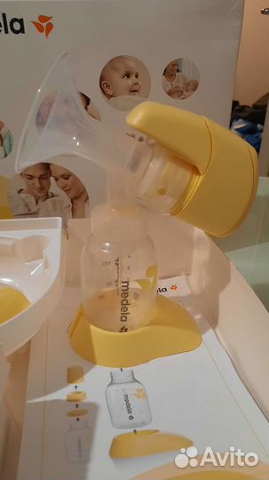 Молокоотсос medela электрический