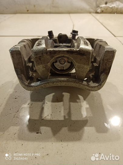 Суппорт(задний левый) (Hyundai Sonata viii DN8)