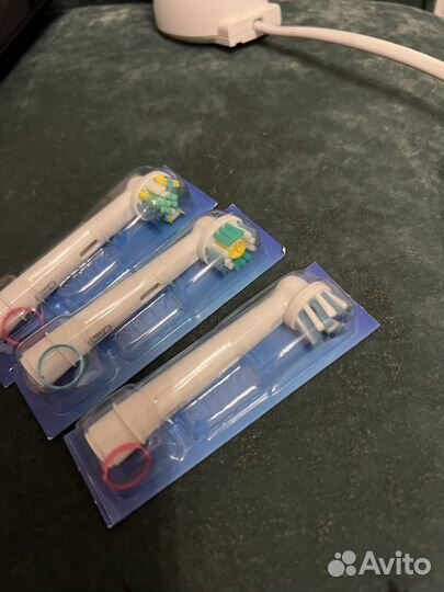 Электрическая зубная щетка oral braun