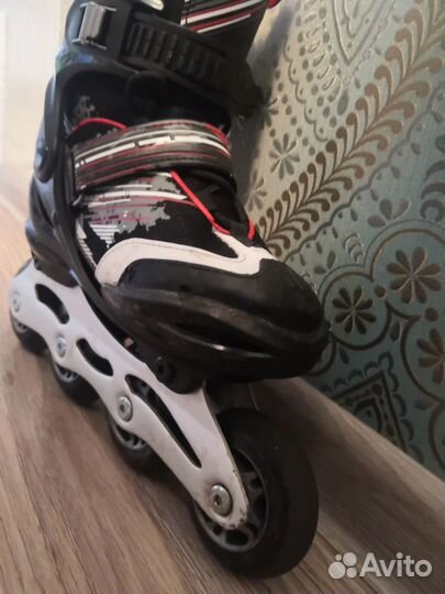 Роликовые коньки