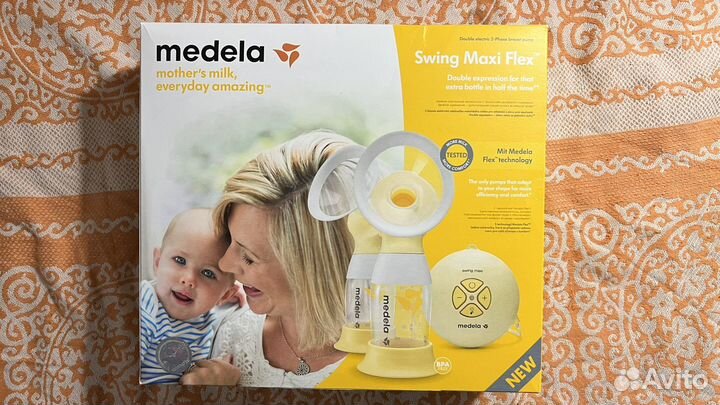 Молокоотсос medela электрический swing flex