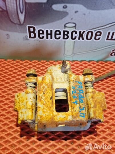 Суппорт тормозной задний правый Toyota Land Cruise