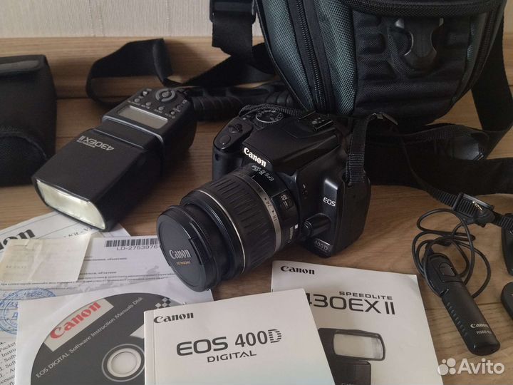 Фотоаппарат и вспышка Canon