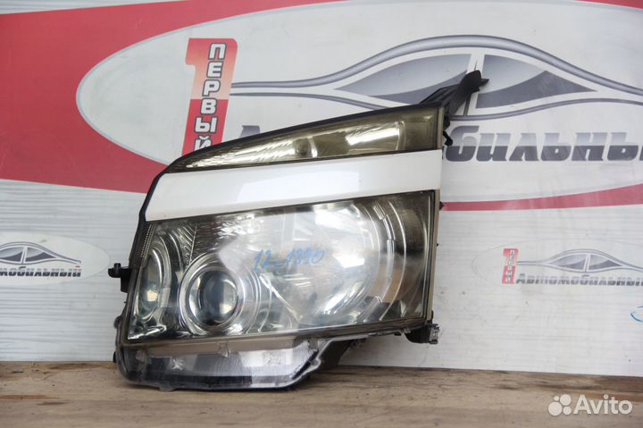 Фара лево c Toyota Voxy ZRR70G 3RZ-FE