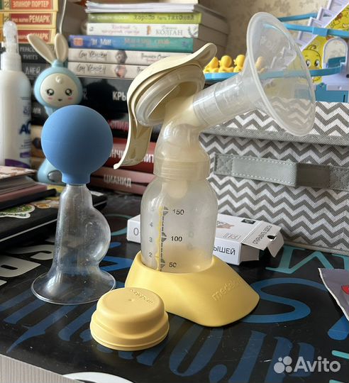 Молокоотсос medela