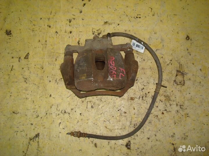 Суппорт Toyota Noah AZR65G (Переднее Левое)