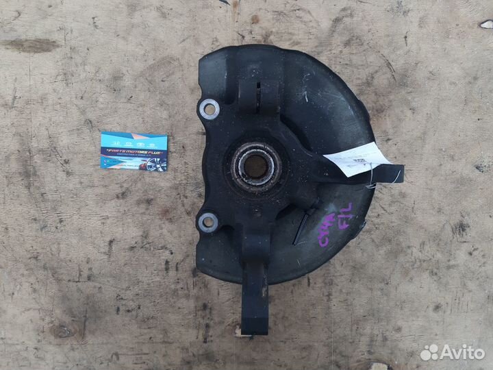 Кулак поворотный левый Мицубиси Лансер X