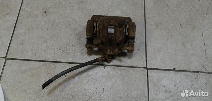 Суппорт задний левый Kia Soul AM 2009-2014