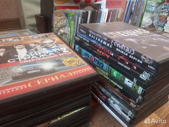 DVD диски с фильмами и мультфильмами пакетом