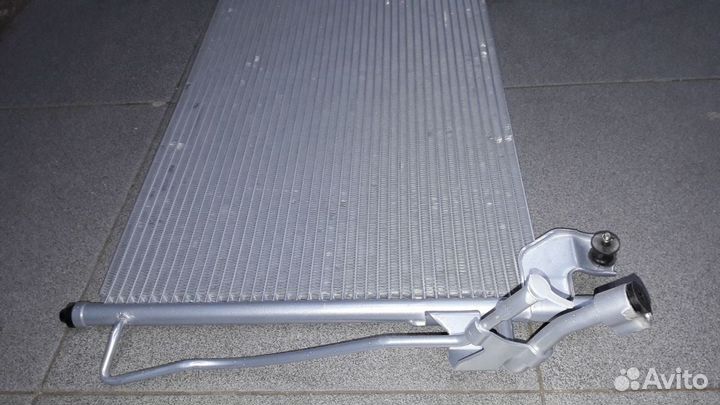 Радиатор кондиционера mazda CX-7 06-13 гг