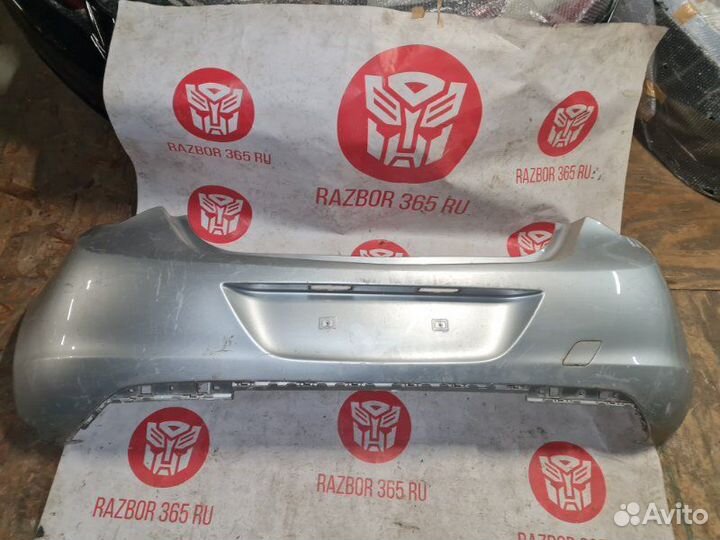 Бампер задний Opel Astra J
