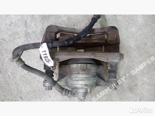 Суппорт тормозной передний правый Mazda 2 DY