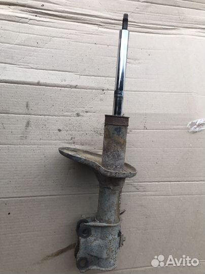 Стойка передняя левая Чери Фора