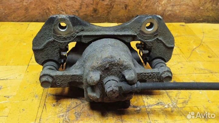 Суппорт передний левый Mitsubishi Lancer 9 1.3