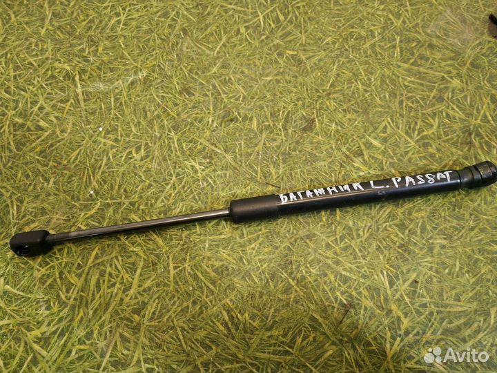 Амортизатор крышки багажника Volkswagen Passat B7