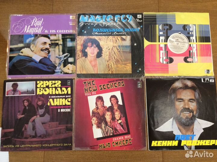 Виниловые пластинки очень много