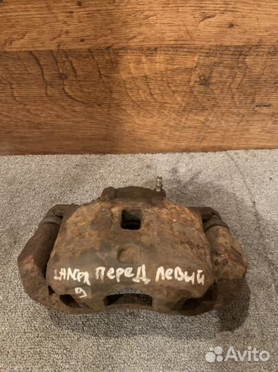 Суппорт передний левый mitsubishi lancer 9